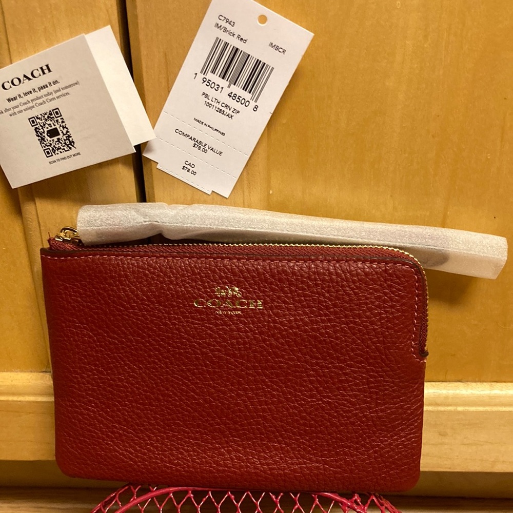 Coach red brick wristlet.